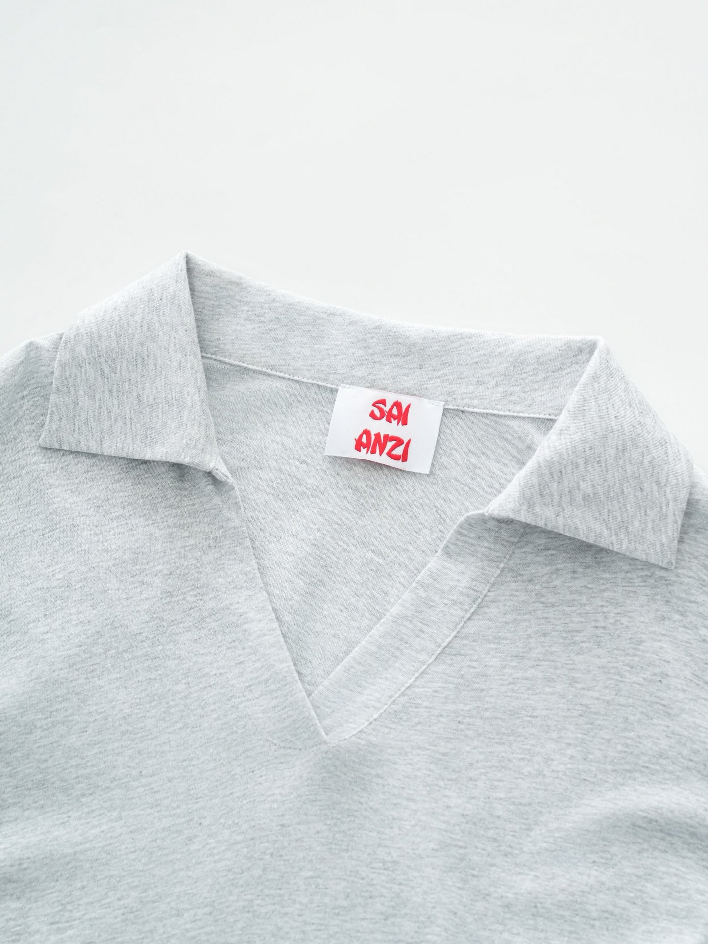 oversized loose-fit polo shirt